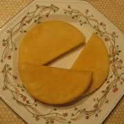 A plate displaying three pieces of Bammies, cut in half-circle shapes